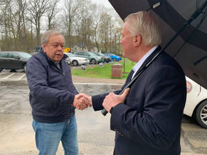 Mike Gibbons Shaking Hands With Local Wallpaper