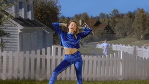 Miley Cyrus Enjoys A Sunny Day In Her Suburban Neighborhood Wallpaper