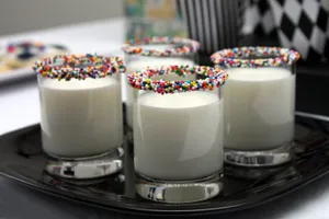 Milk On Glass With Sprinkles Design Wallpaper