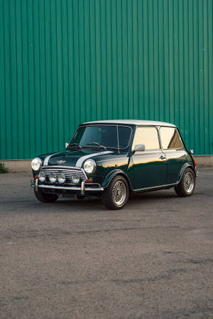 Mini Car With Green Wall Wallpaper