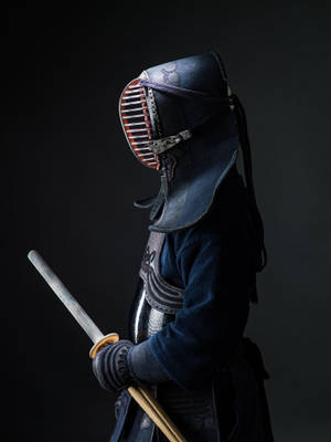 Minimalist Kendo Warrior Wearing Dark Blue Hakama Wallpaper