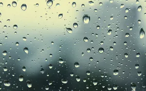 Misty Raindrops On A Glass Pane Wallpaper