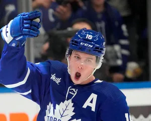 Mitchell Marner In Celebratory Pose After Victory Wallpaper