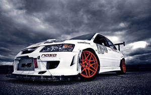 Mitsubishi Lancer Orange Wheels Wallpaper