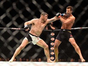 Mma Athlete Michael Bisping And Luke Rockhold Match Wallpaper