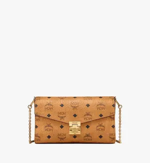 Modern Elegance With Mcm Millie Mini Bag Wallpaper