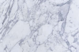 Modern Marble Desktop Overlooking City Skyline Wallpaper