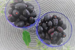 Moist Java Plums In Transparent Containers Wallpaper