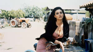 Monica Bellucci Farm Scene4 K Wallpaper