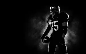 Monochromatic College Football Player Wallpaper