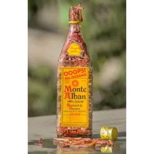 Monte Alban Mezcal Filled With Gusano Worms Wallpaper
