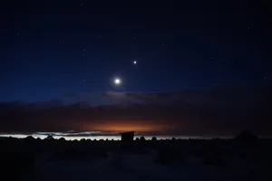 Moon In A Starry Night Sky Wallpaper