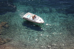 Motorboat In French Polynesia Sea Wallpaper