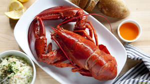 Mouthwatering Lobster On Plate Wallpaper