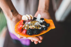 Mulberry And Other Fruits On Sliced Papaya Wallpaper