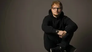 Multi-platinum Singer-songwriter Ed Sheeran In A Black Hoodie Wallpaper