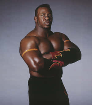 Muscled Wrestler Pose Wallpaper