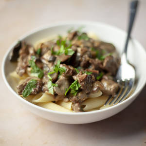 Mushrooms And Beef Stroganoff On Penne Pasta Wallpaper