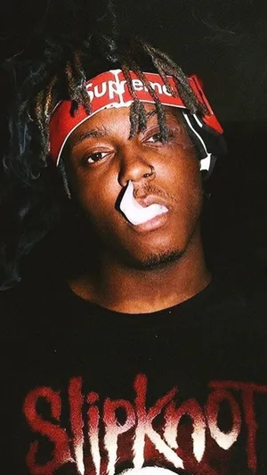 Music Legend Juice Wrld Escapes The Chaos And Sadness Of Life In The Colors Of His Own Unique Aesthetic Wallpaper