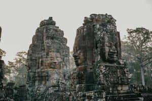 Mysterious Stone Face In Angkor Thom, Cambodia Wallpaper