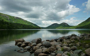 Mystic Beauty Of Acadia National Park Under Dark Clouds Wallpaper