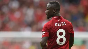 Naby Keita In Action On The Field Wallpaper