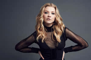 Natalie Dormer Striking A Confident Pose Wallpaper