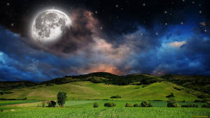 Natural Grass Field Under Full Moon Wallpaper