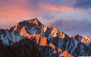 Natural Snowy Mountain Under Purple Sky Wallpaper