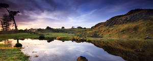 Nature's Beauty - A Picturesque Wide Landscape Of Endless Blue Sky Wallpaper