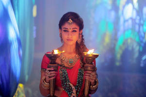 Nayanthara In Saree With Candles Wallpaper