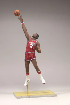 Nba Athlete Moses Malone Figurine Wallpaper