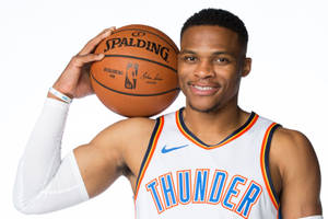 Nba Star Russell Westbrook's Dynamic Smile. Wallpaper