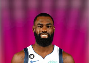 Nba Star Tim Hardaway Jr. Poster Wallpaper