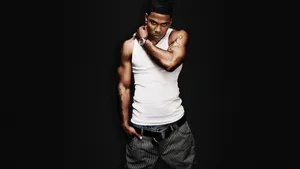 Nelly Posing With A Fierce Expression Wallpaper