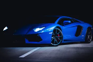 Neon Blue Lamborghini Night Scene Wallpaper