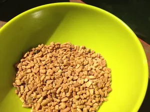 Neon Green Bowl Of Fenugreek Seeds Wallpaper