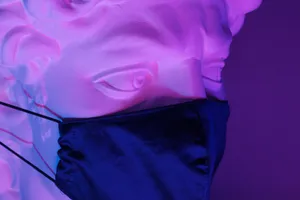 Neon Purple Iphone Sculpture With Mask Wallpaper