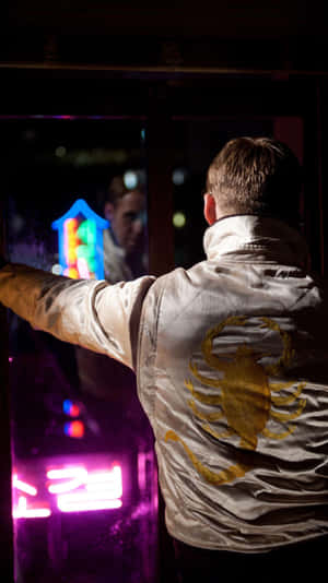 Neon Reflections_ Man In Jacket Wallpaper