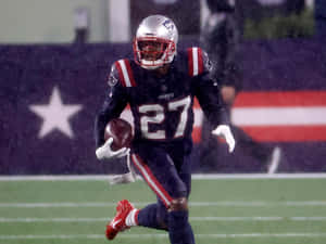 New England Cornerback Jc Jackson Against Baltimore Ravens Wallpaper