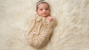 Newborn Baby Love On Faux Fur Wallpaper