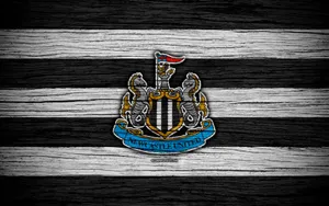 Newcastle United Fc Logo On Wood Wallpaper