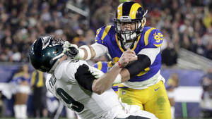 Nfl Match Aaron Donald And Nick Foles Wallpaper