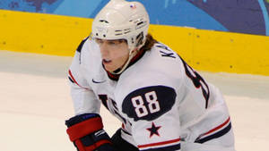 Nhl Star Patrick Kane In Action Playing For Team Usa Wallpaper