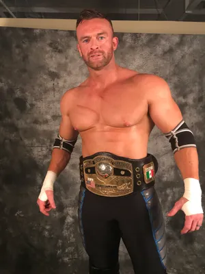 Nick Aldis - Commanding Pro Wrestling Champion Wallpaper
