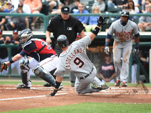 Nick Castellanos Slides Towards The Base Wallpaper