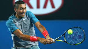 Nick Kyrgios In A Tennis Match Wallpaper