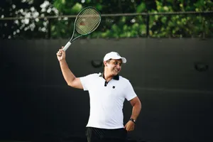 Nicolas Almagro Posing With Racket Wallpaper