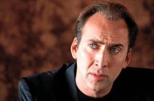 Nicolas Cage Brown Background Wallpaper