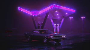 Nighttime Elegance: Glossy Black Car Under Neon Purple Gas Station Lights Wallpaper